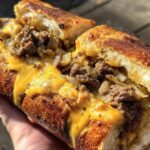 Philly cheesesteak stuffed garlic bread